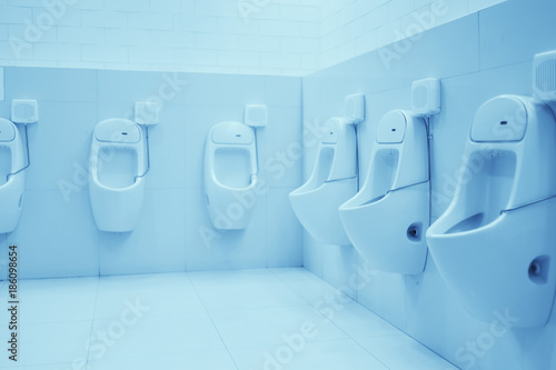 Urinals In White Clean Public Men Toilet Restroom Interior Background Buy This Stock Photo And Explore Similar Images At Adobe Stock Adobe Stock