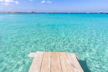 Sea Wooden Pier And Transparent Water