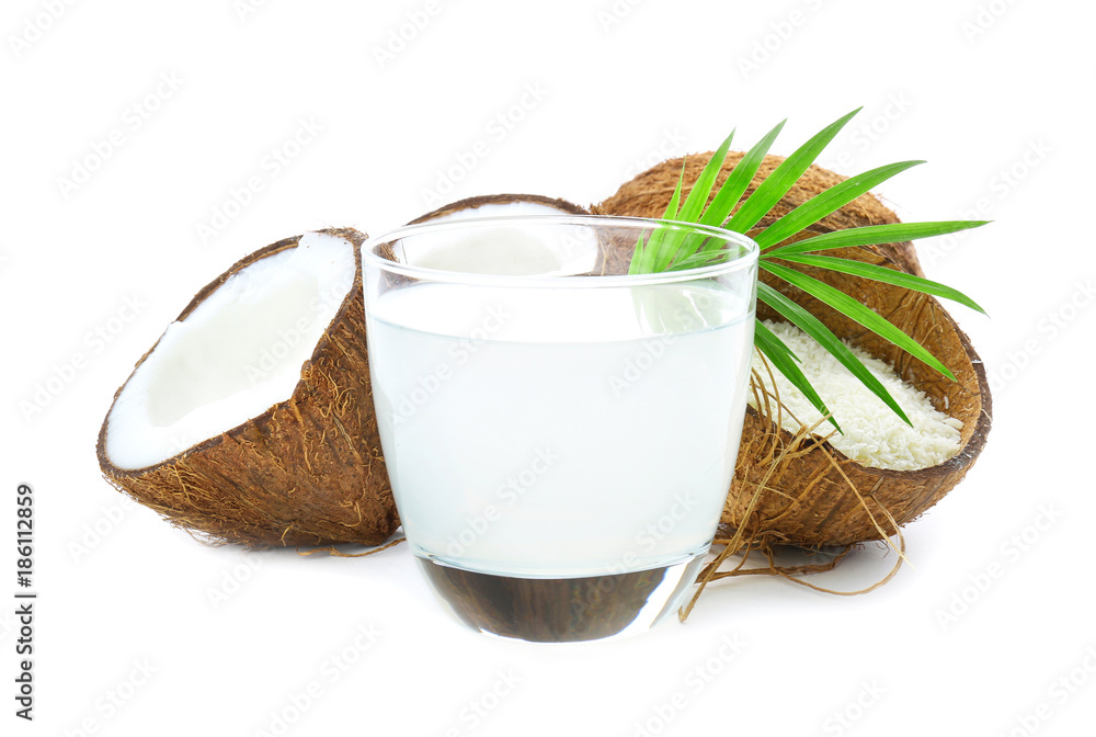 Composition with fresh coconut water on white background