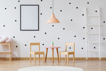 Wall Mural - Dots wallpaper and wooden furniture