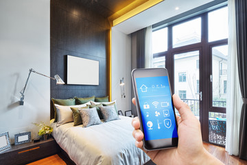 smart phone with smart home with modern bedroom