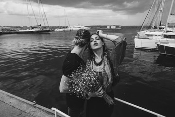 Guy and girl on pier