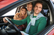 © Africa Studio - Young family with cute boy and dog in car