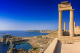 Fototapeta  - View of St. Paul´s bay and ancient temple of goddess Athena on acropolis of Lindos (Rhodes, Greece)