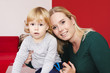 © grufnar - portrait of a happy mother with a son in a living room