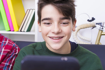 young teenager or preteen with mobile phone