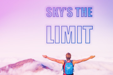 SKY'S THE LIMIT sentence written on pink sky with clouds at sunset copy space. Man with open arms inspirational picture for motivational quote for life challenge for success. Reach your goals.