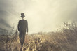 © Cristina Conti - traveling man walks solitary in wild nature