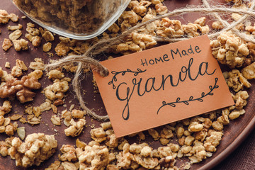 homemade crunchy granola with label on tray