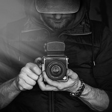 A Man With A Camera. Black And White Photography