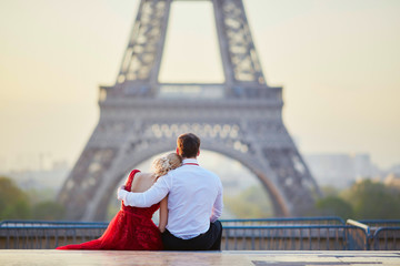 Couple near the Eiffel tower in Paris, France