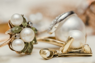 Earrings with Pearl on white background