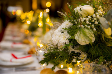 Wall Mural - white table set for party with flowers, candle and bulbs