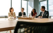 © Jacob Lund - Business people having meeting in a board room