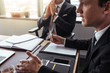 © Jacob Lund - Businessman talking with someone during meeting