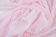 Texture chiffon fabric pink color for backgrounds 