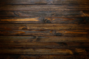 Natural wood texture. Wood background. Dark rustic planks table top flat lay view.