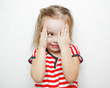 © Ilshat - Funny little girl that cheats in hide and seek game
