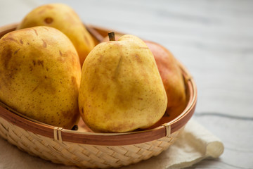 Wall Mural - Fruit background. Fresh organic pears on old wood. Pear autumn harvest