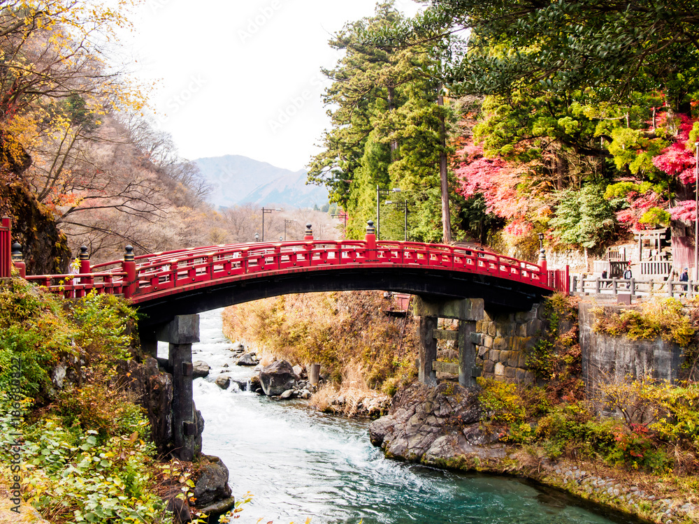Shinkyo Bridge , red old bridge in Nikko , Japan, obrazy, fototapety,  plakaty - BajeczneObrazy.pl