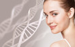 Portrait of sensual woman among DNA chains