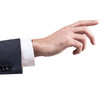 Man's hand in suit pointing in the air.
