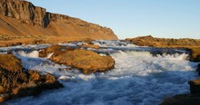 Scenic River With Rapids In Iceland