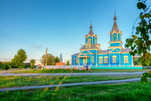 Orthodox Church In The Village Of Red Partisans At Sunset