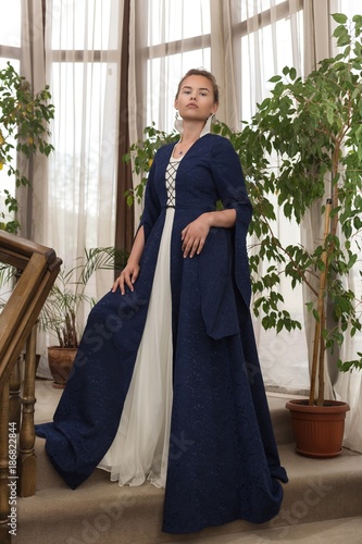 Woman In Medieval Princess Dress Sitting On Stairs Indoor Lady