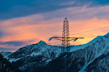 electricity transport on high voltage poles in the mountains