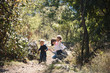 © photographmd - Mother and Children in Forest