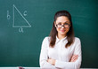 © stockartstudio - young teacher near the board