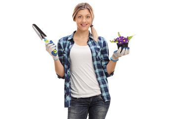 Poster - Female gardener with a spade and a flower pot