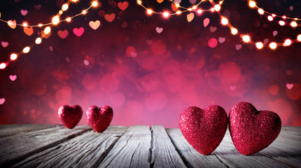 Wall Mural - valentines card - two hearts on table