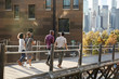 © Monkey Business - Group Of Friends Walking With Manhattan Skyline In Background