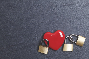 Wall Mural - Valentines love concept. Red heart with padlock