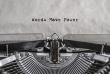 Words Have Power - Words, Phrase. Retro Vintage Aged Typewriter With White Blank Sheet Of Paper