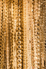 Texture From Strings Of Various Gold Beads