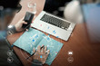 © everythingpossible - close up of businessman working with smart phone and digital tablet and laptop computer  on wooden desk in modern office with virtual icon diagram