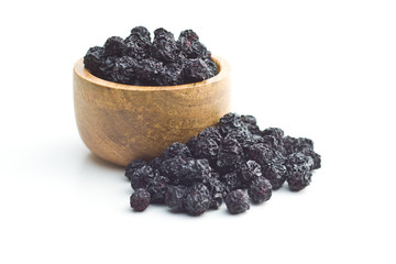 Dried chokeberries. Black aronia berries.