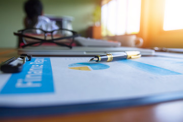 Pen,keyboard,calculator,report graph chart on office table,for Business.