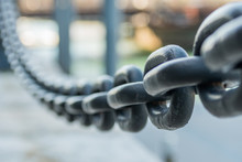 Large Iron Chain Fades Out Of Focus