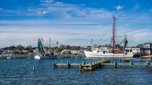 Fishing Boats At Dock With Nets