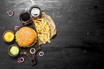 Poster - Street food. Fresh burger with cola, fries and sauces.