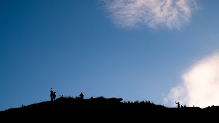 Silhouette shot, Group of tourist on high mountain, Phu chi fa, Chaingrai, Thailand