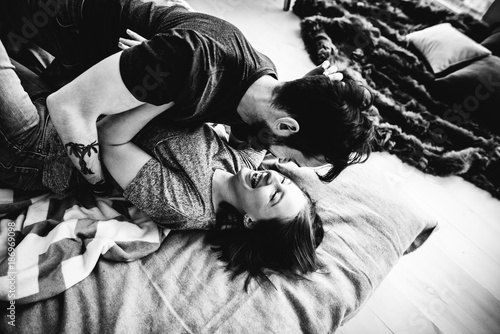 How to be on top of a guy in bed Love Story Man And Woman Lie In Bed Hug Each Other And Laugh Happiness Couple Morning Bed Top View Black And White Photo Stock Photo Adobe Stock