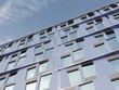 © Westend61 - Part of facade of modern high-rise building, D-Rendering