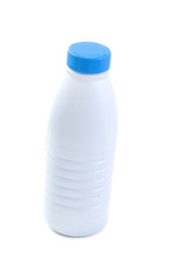 Plastic bottle with blue lid for dairy foods. Isolated on white.