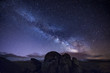 © Westend61 - Milky way over ancient granite rocks