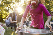 © Monkey Business - Pre-teen girl apple bobbing, with apple in mouth, close up